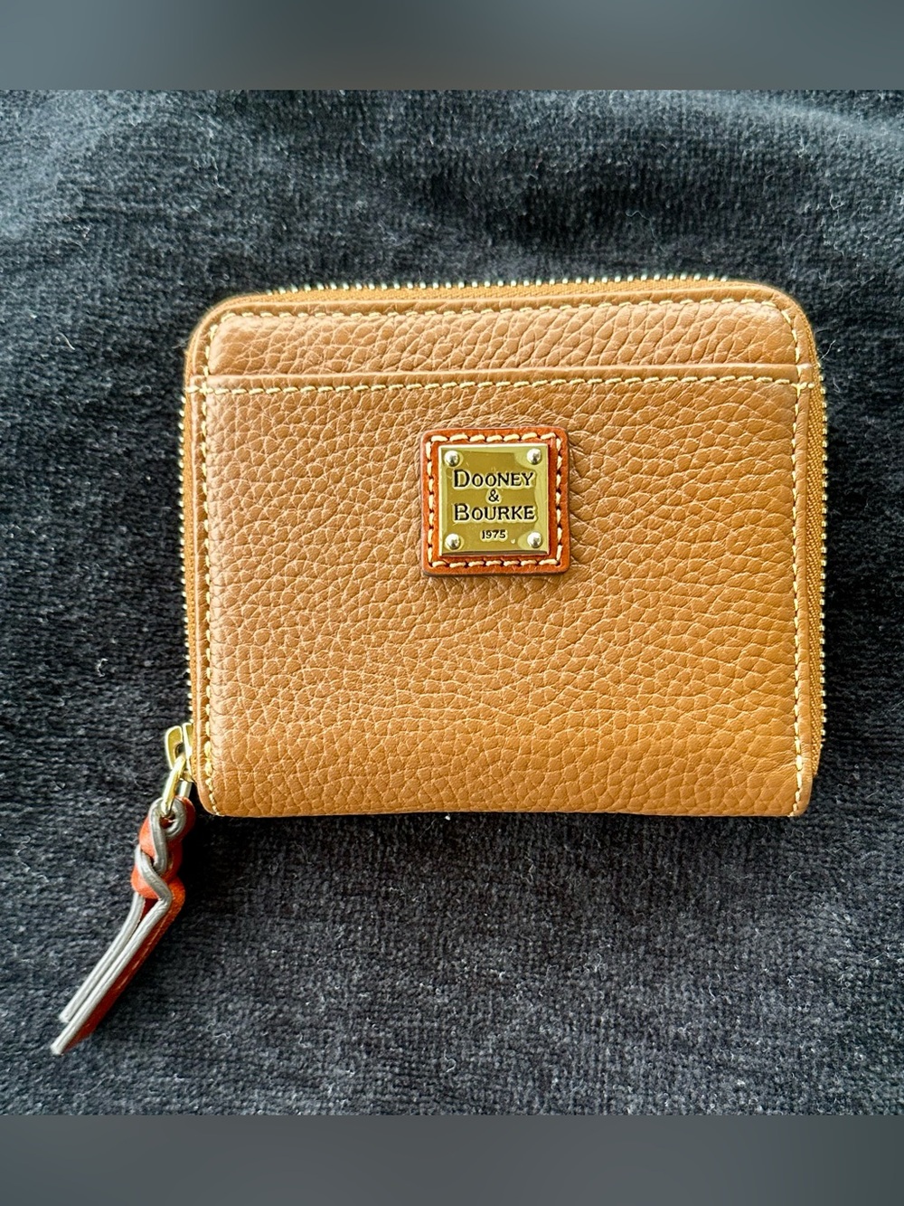 Dooney & Bourke Pebbled Tan Leather Zip Wallet with Logo Plate